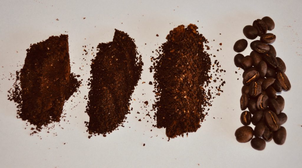 Photograph showing coffee grinds to four different consistencies.